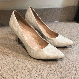 The limited ivory faux python heels Sz 8 38.5